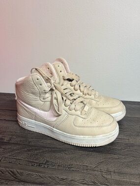 Nike Women's High-Top Sneakers in Beige with Pink Swoosh